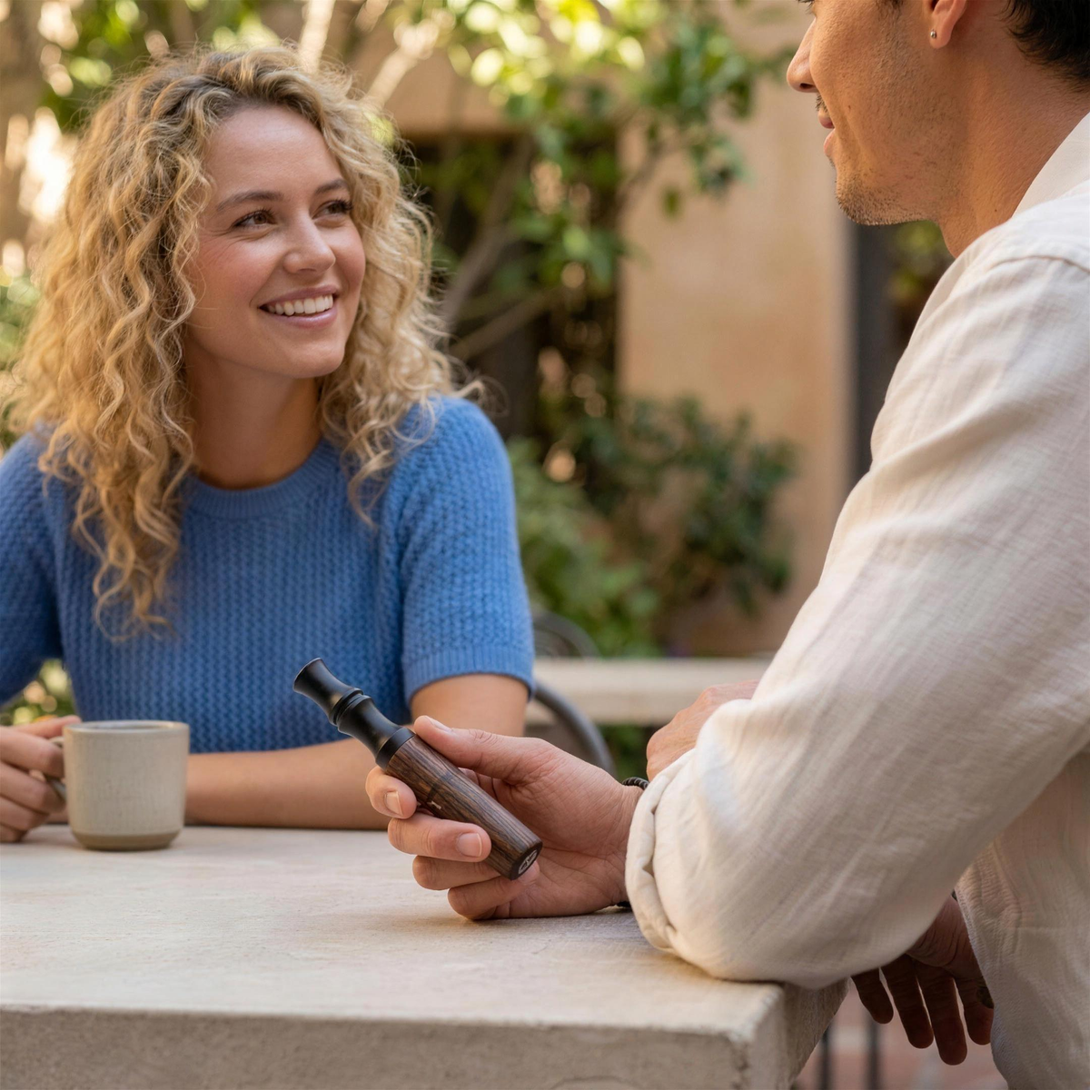 A conversation, uninterrupted — Hale at a café table